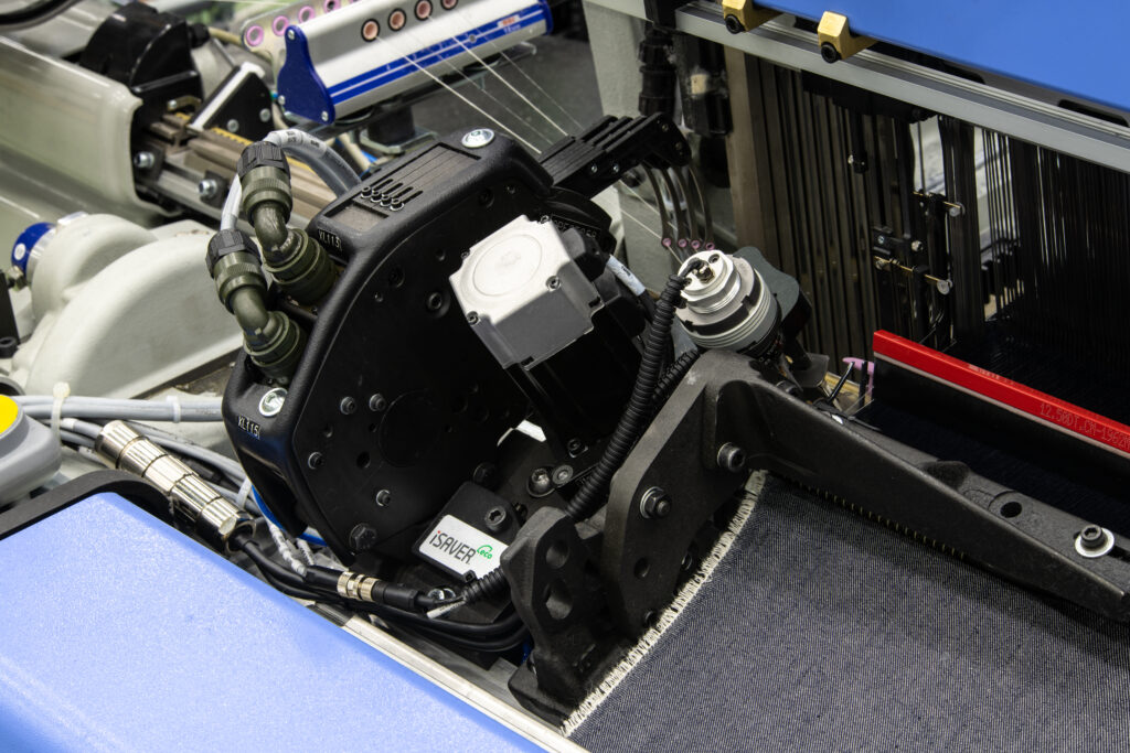 Itema, innovazione e sostenibilità nel segno del Made in Italy. Dettaglio macchinario filatura tessile